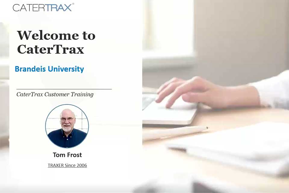 Training slide: Welcome to CaterTrax - CaterTrax Customer Training (Tom Frost) with a picture of a hand on a keyboard