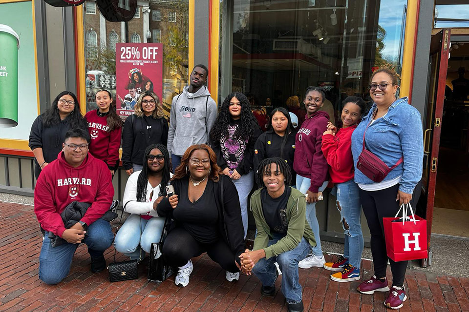 A group of students smile for a photo.