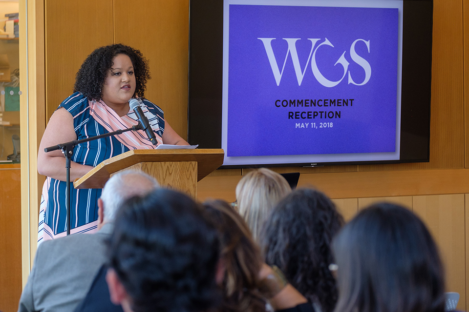 Alexandra Thomas speaks at the 2018 WGS award ceremony and commencement reception
