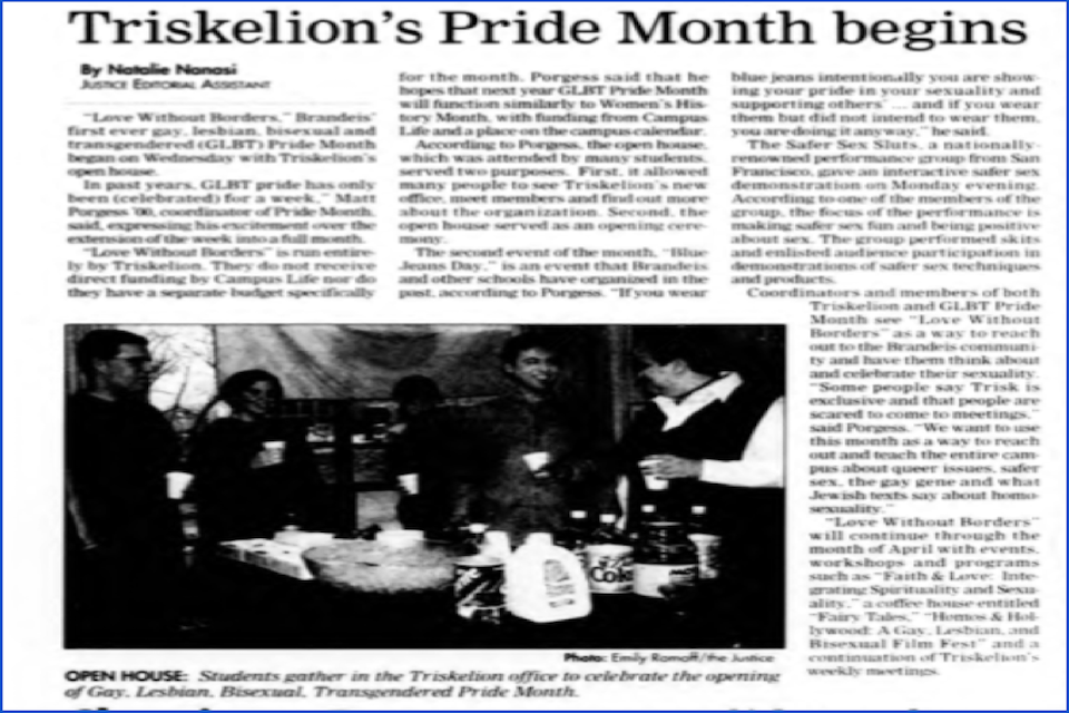 An article from the Justice by Naomi Nanasi titled "Triskelion's Pride Month begins." The article features a black and white picture captioned "Open House: Students gather in the Triskelion office to celebrate the opening of Gay, Lebian, Bisexual, Transgendered Pride Month." The pho features five visible students and a table of refreshments.