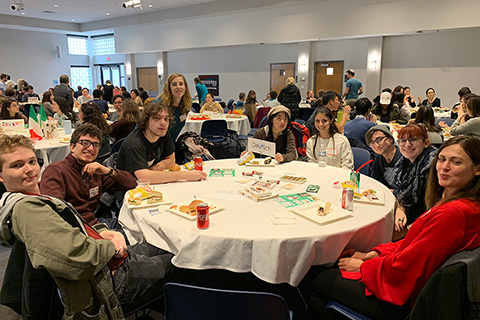 students seated at german language table