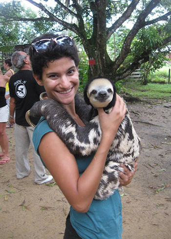 katherine kolios holds a sloth at sanctuary in french guiana