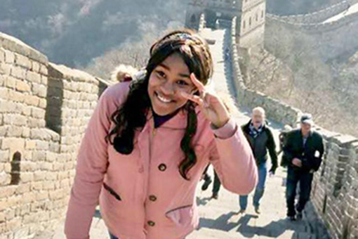 minnie norgaisse walks steps of great wall of china