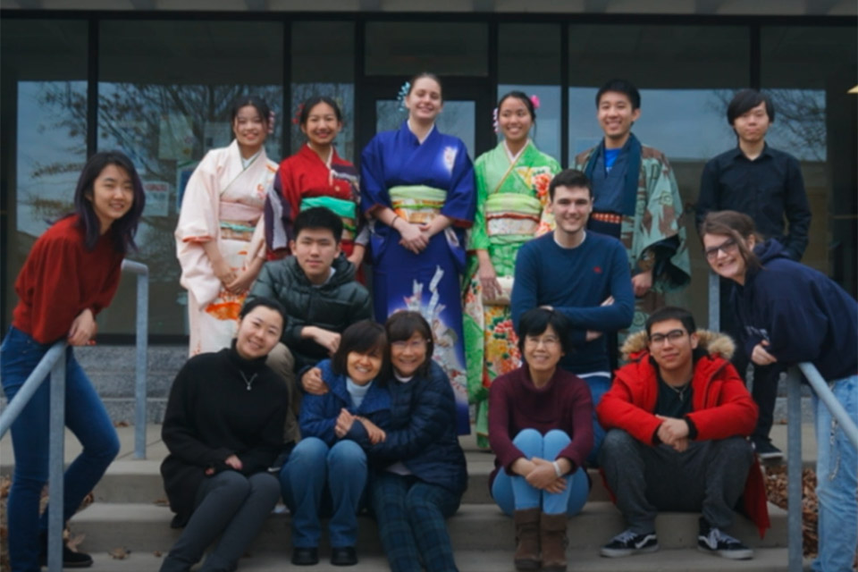 group shot of japanese language faculty on steps