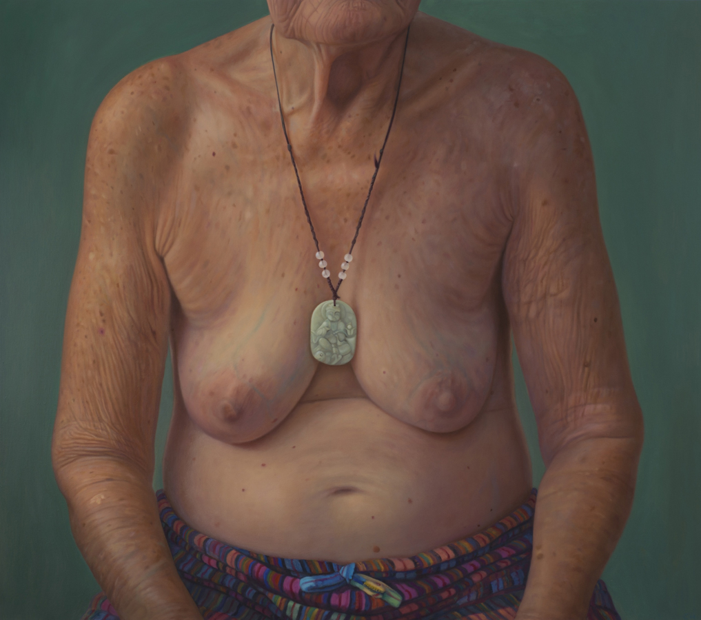 Clarity Haynes' large scale painted portrait entitled "Jaece." depicts a woman's torso and breasts from her navel up to her shoulders. She is wearing shorts  and a pendant, but no shirt. 2015. Oil on linen, 58" x 66". 