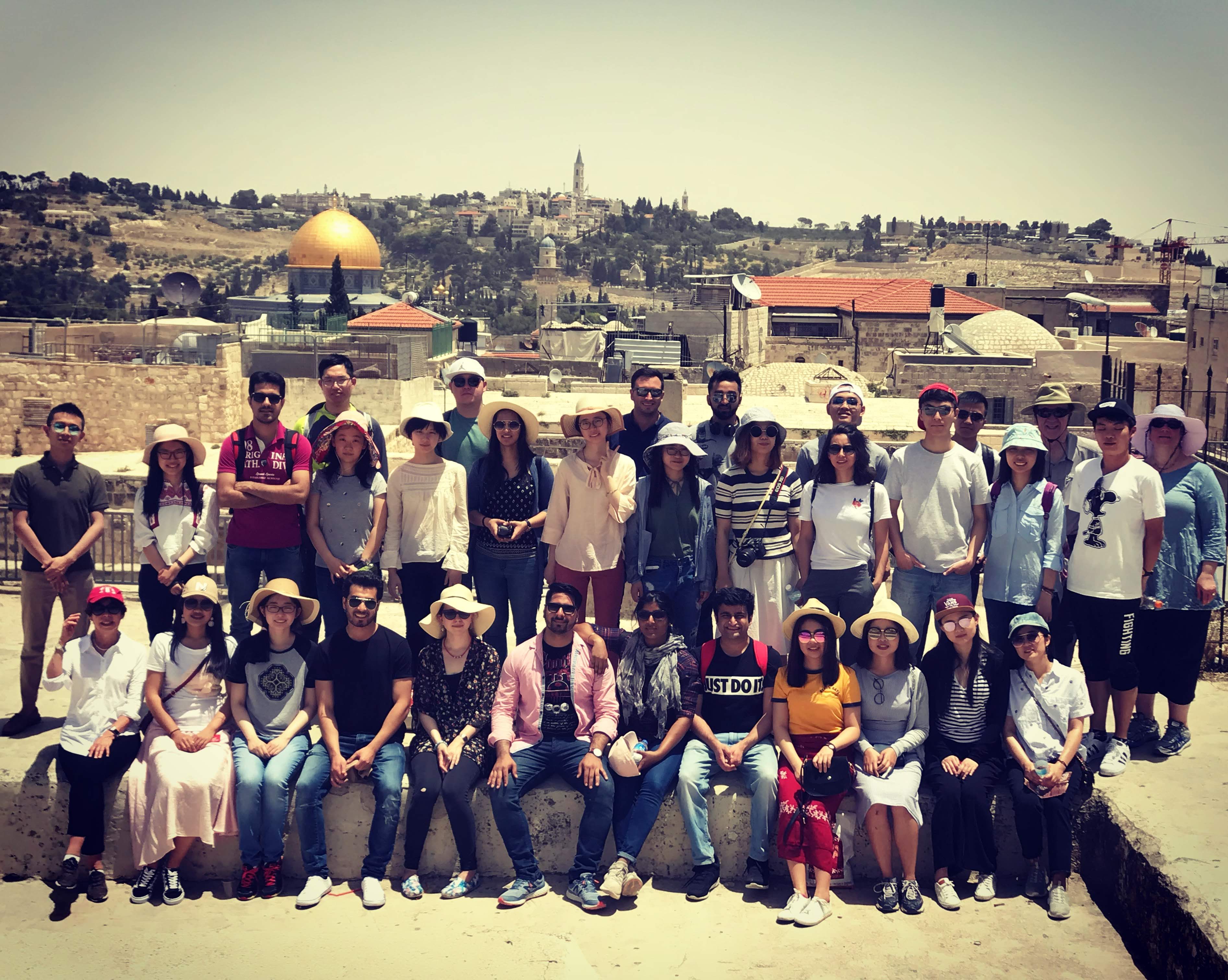 Hassenfeld fellows in Jerusalem taking in a rooftop view of the Old City.