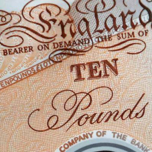 A close up of a ten pound note.