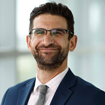 Headshot of Tom Screnci.