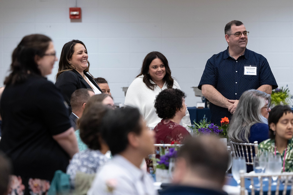 From left, Professor of Sculpture Tory Fair, Economics Professor Mahsa Akbari, Professor Carole Carlson, President Ron Liebowitz, Professor of University Writing Lisa Rourke, Professor of Russian Irina Y. Dubinina, Professor of Sociology Gowri Vijayakumar, Professor of Politics Jeffrey Lenowitz and Physics Professor W. Benjamin Rogers during a celebration dinner for newly promoted faculty with the Board of Trustees at Brandeis University on April 23, 2023. Freelance Photo/Ken McGagh