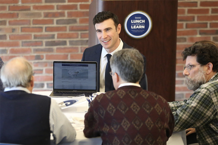 Hiatt Director Jon Schlesinger presents to faculty