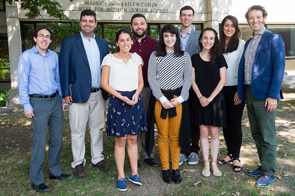 Class of 2020 Hornstein graduate students in a group outside on the lawn