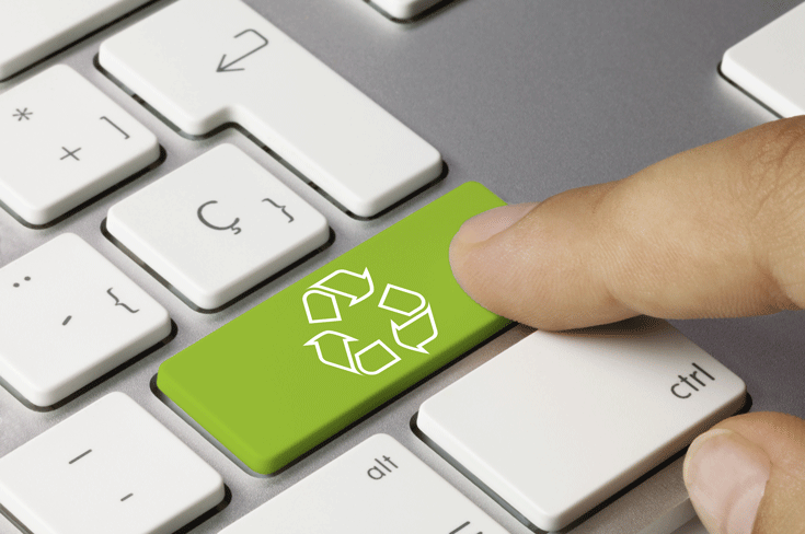 computer keyboard with recycle sign