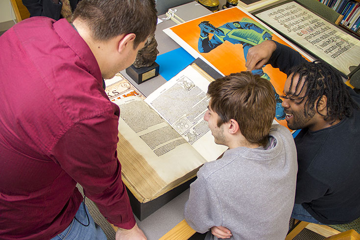 Students view materials in Archives & Special Collections