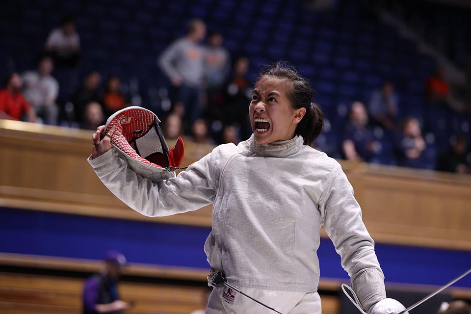 Maggie Shealy screams with joy during fencing match