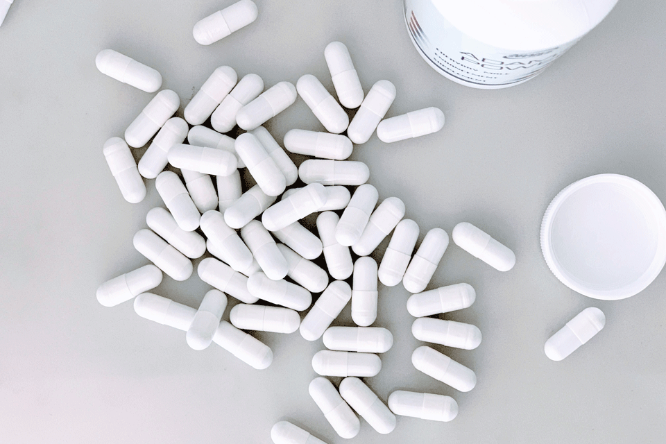 A pile of pills on a table