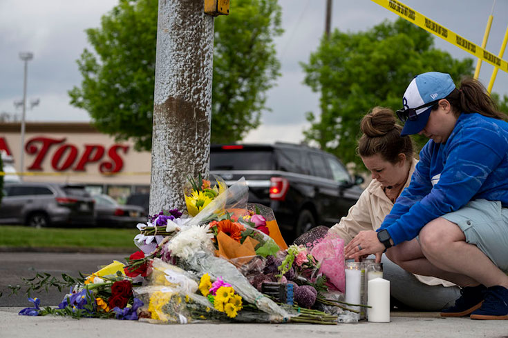A memorial site in a parking lot.